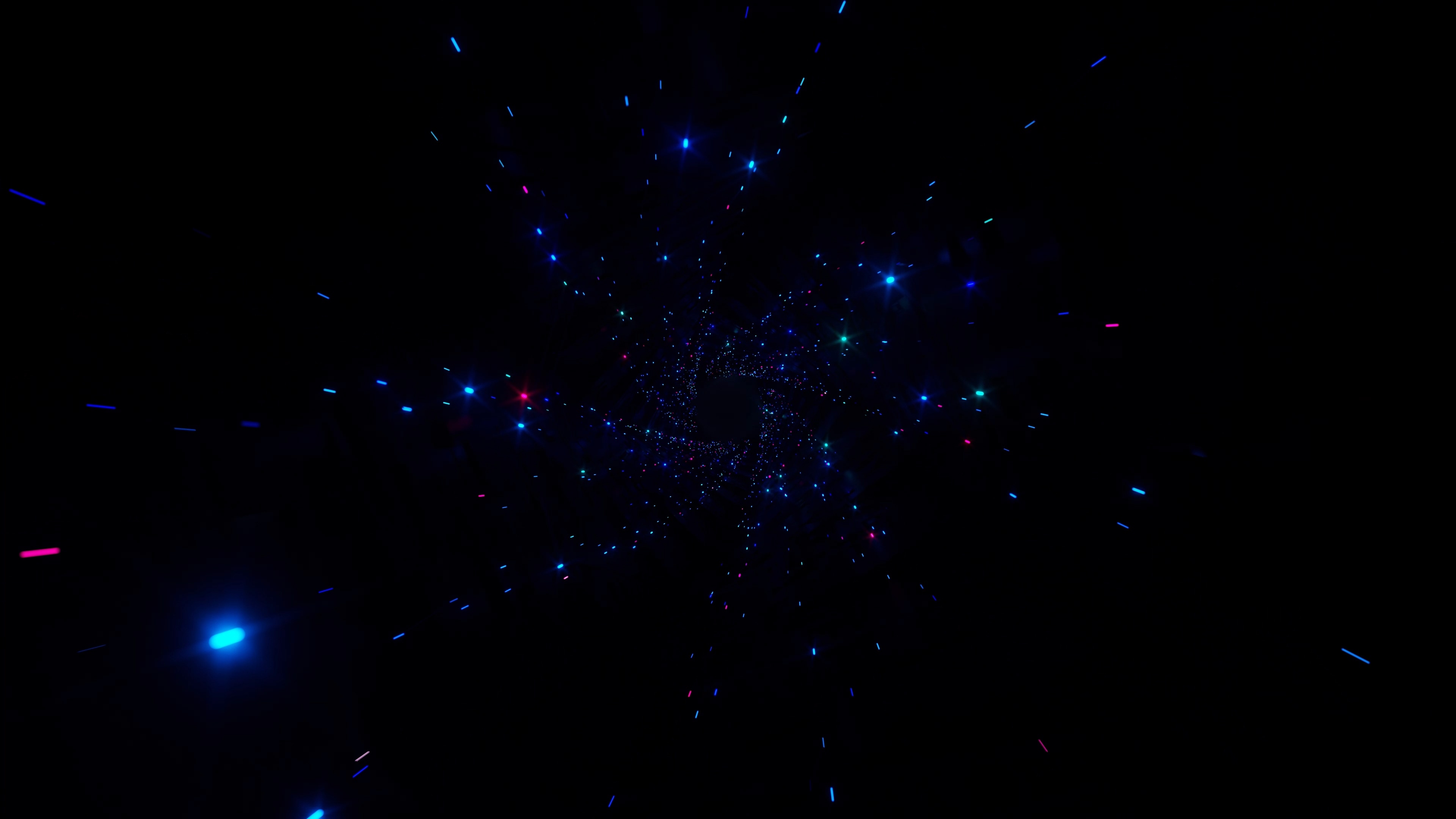 Star field test of blue, cyan and pink points streaking outward from a dense central cluster against black space